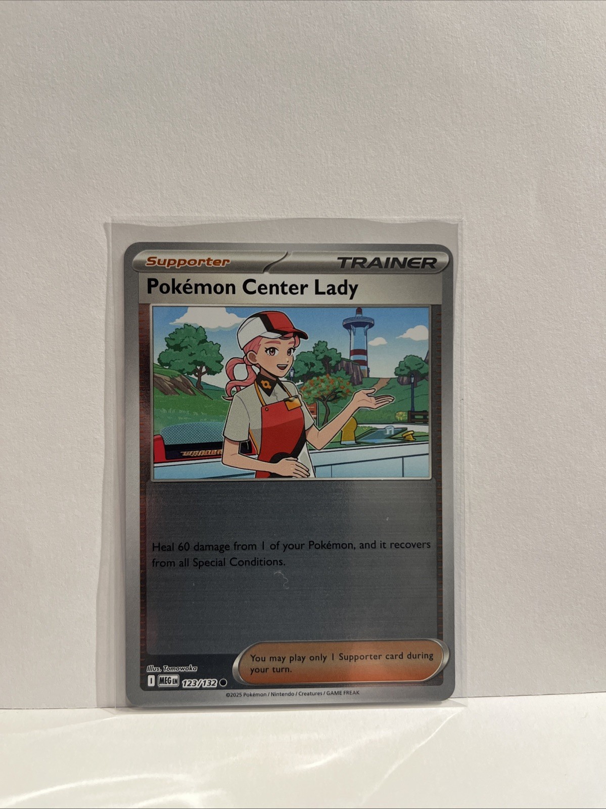 Pokemon Center Lady 123/132 Me01: Mega Evolution Reverse Holo