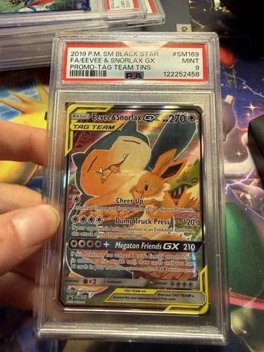 Pokémon Eevee & Snorlax GX SM Black Star Promo SM169 Holo TAG TEAM PSA 9