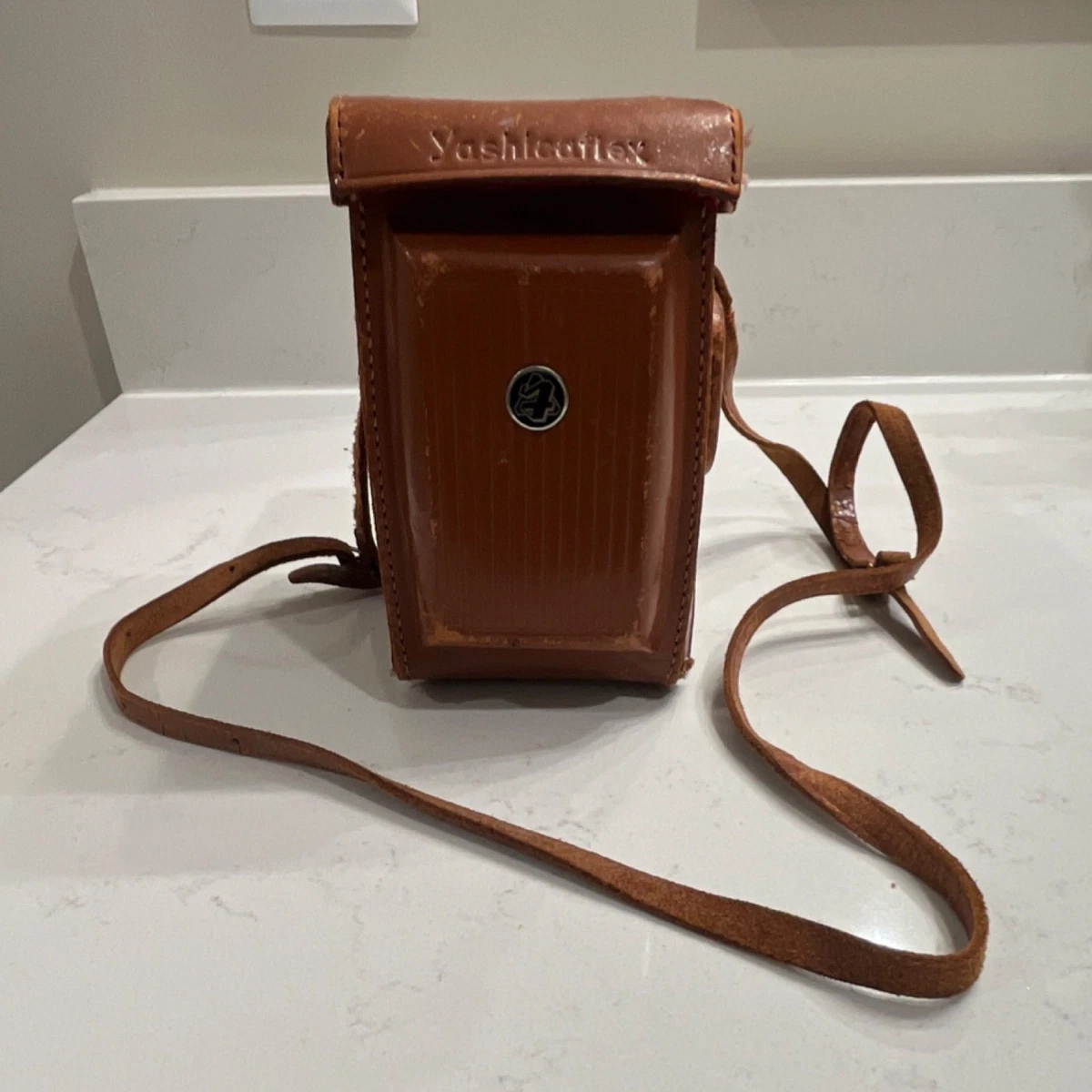 A leather cased Vintage Camera A Yashica Mat LM