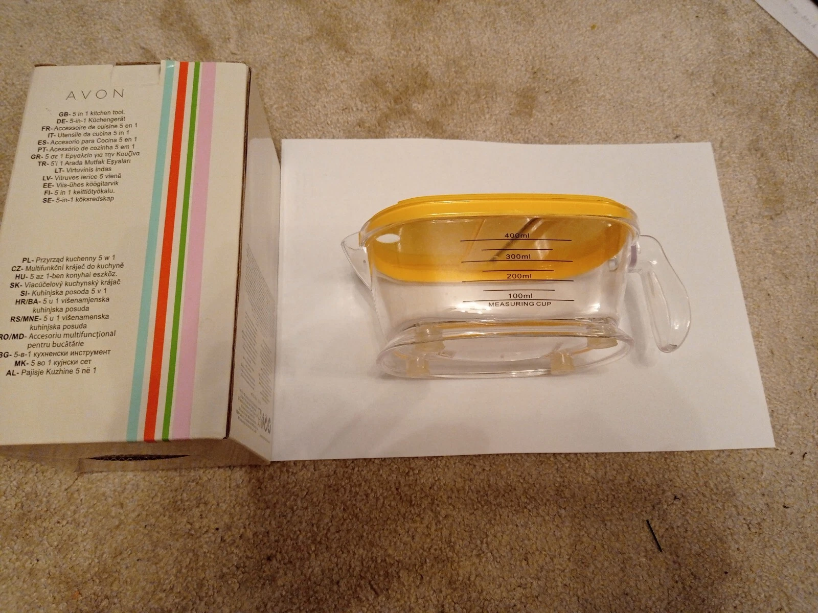 Avon 5-in-1 Kitchen Tool. Lemon Squeezer, Grater, Egg Separator, Measuring Cup