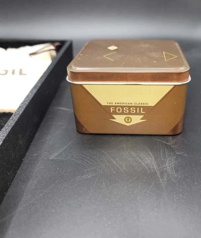 Pulsera con dije de oro rosa fósil Foto 2 de 4