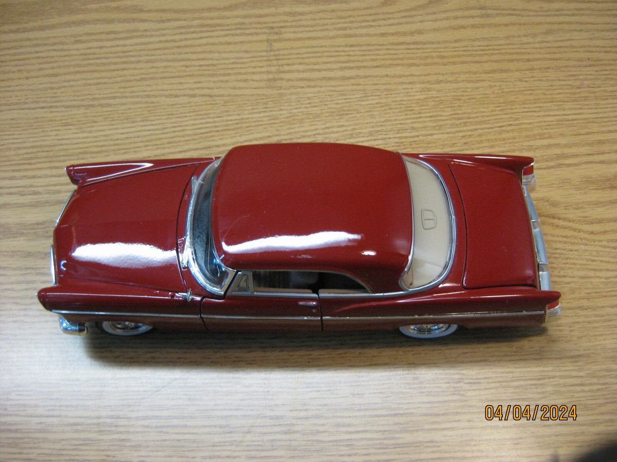 1/18 1956 CHRYSLER 300 B, IN DARK RE OR MAROON , BY MAISTO