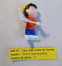 Kinder - Lucy avec crosse de hockey - K00 57 - sans BPZ