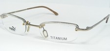Vintage PUMA 13116 162 GOLD EYEGLASSES GLASSES TITANIUM FRAME 49-20-130 Germany