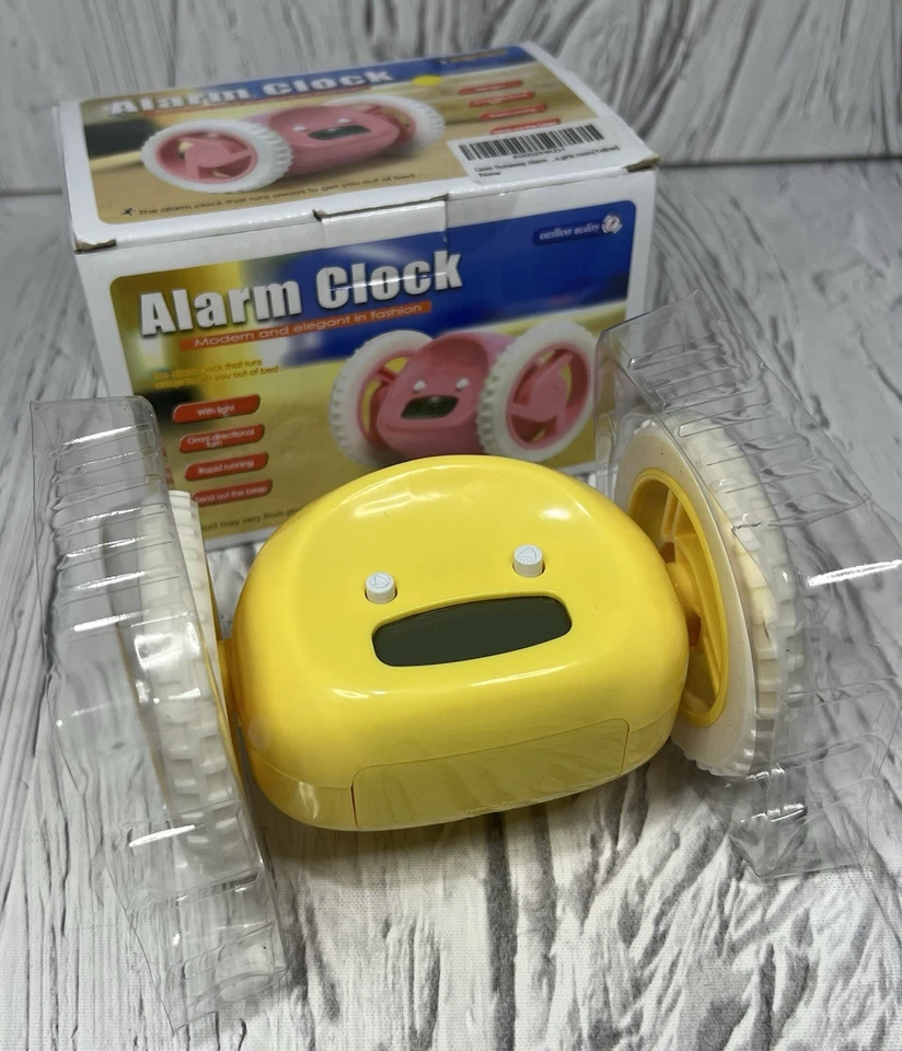 Reloj despertador con ruedas RUISY ROLLS AWAY/Caja abierta amarilla PROBADO Foto 2 de 4