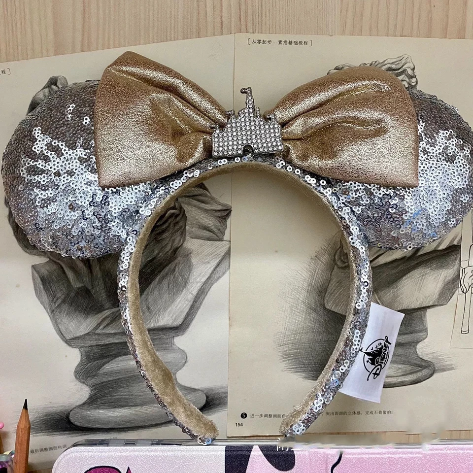 Diadema con arco de orejas de Minnie plateada joya castillo parques Disney lentejuelas París Foto 2 de 4