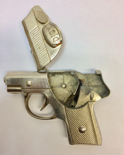vintage 1950s toy pistol  dick tracy  metal cap gun