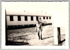 Vtg B W Snapshot Man In Military Uniform Standing Outside Army Barracks 1940s