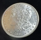 1885 P Morgan Silver Dollar EF light toning ab943