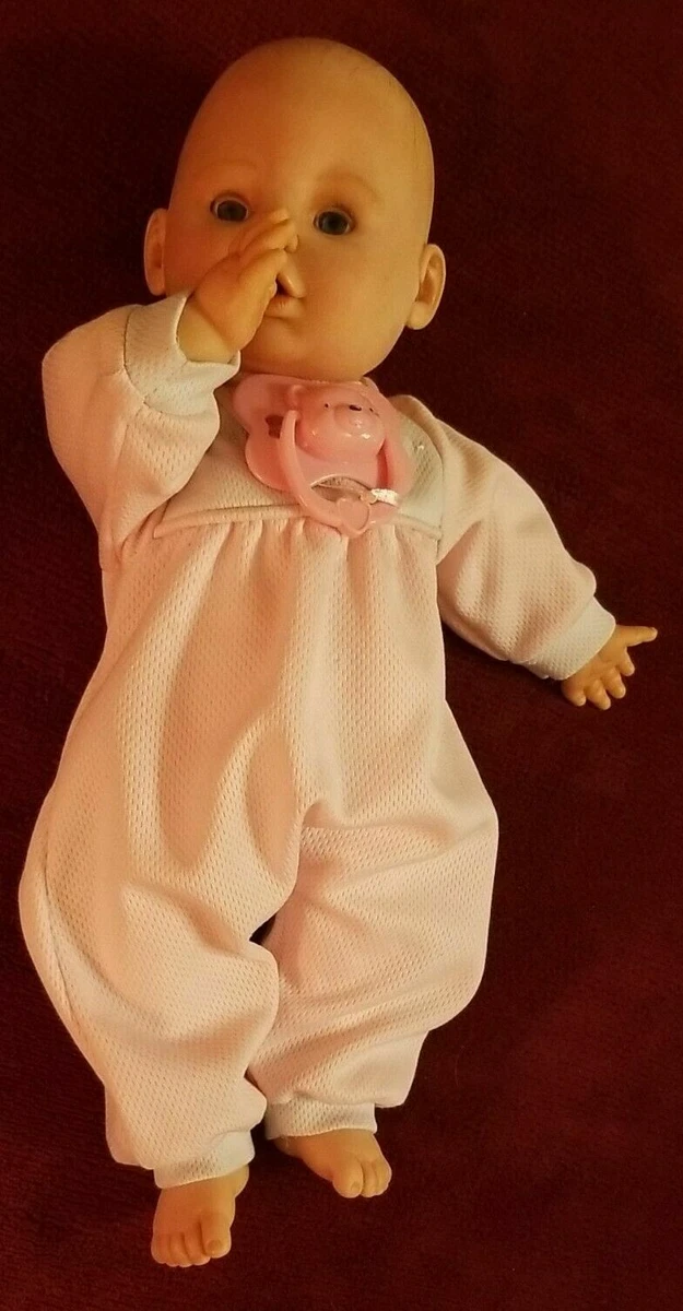 Baby doll with sales magnetic pacifier