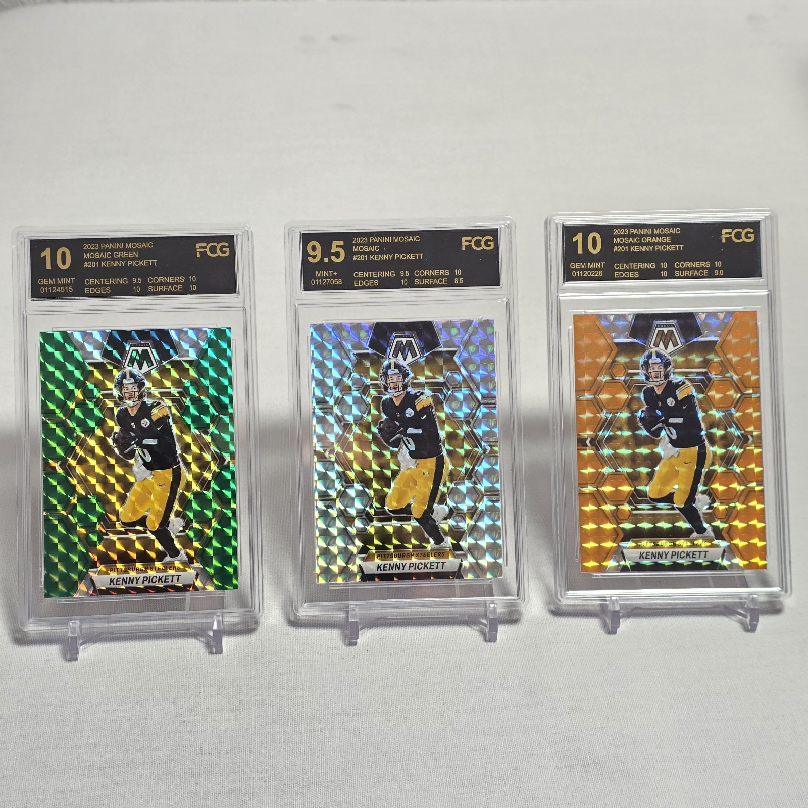 2023 Mosaic Kenny Pickett 3 Card Rainbow #201 Green, Mosaic, Orange /199 Steeler