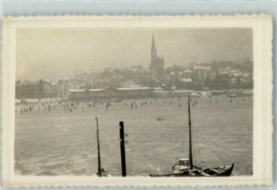 13135943 - 2390 Flensburg Port People Walking on Ice Flensburg, Port /