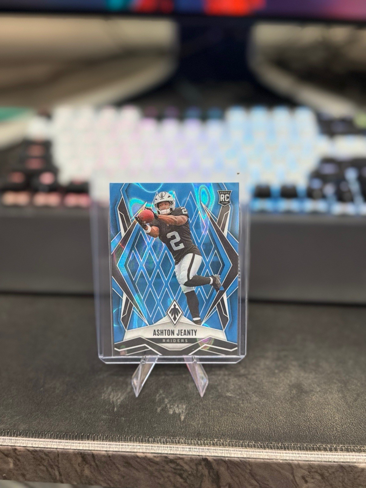 2025 Panini Phoenix - Rookies Ashton Jeanty #158 Light Blue Lava /325 (RC)