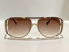 Retro TURA 8751 Burgundy Sunglass - ABossOpticians Vintage Eyewear Gallery