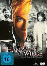 Die Hand an der Wiege