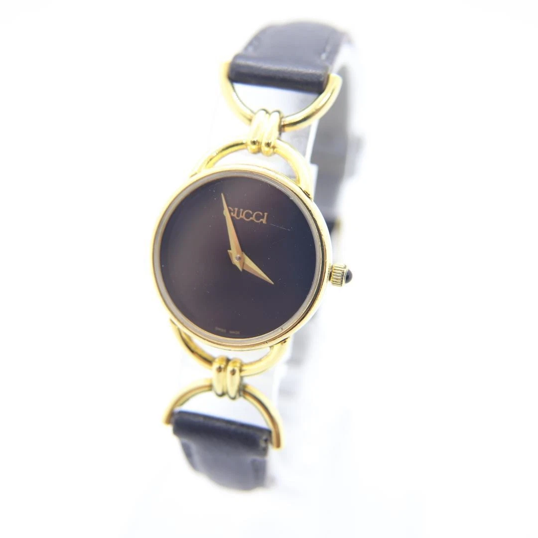 Montre Gucci 60002L femme 22 mm quartz noir ronde fabrication suisse vintage