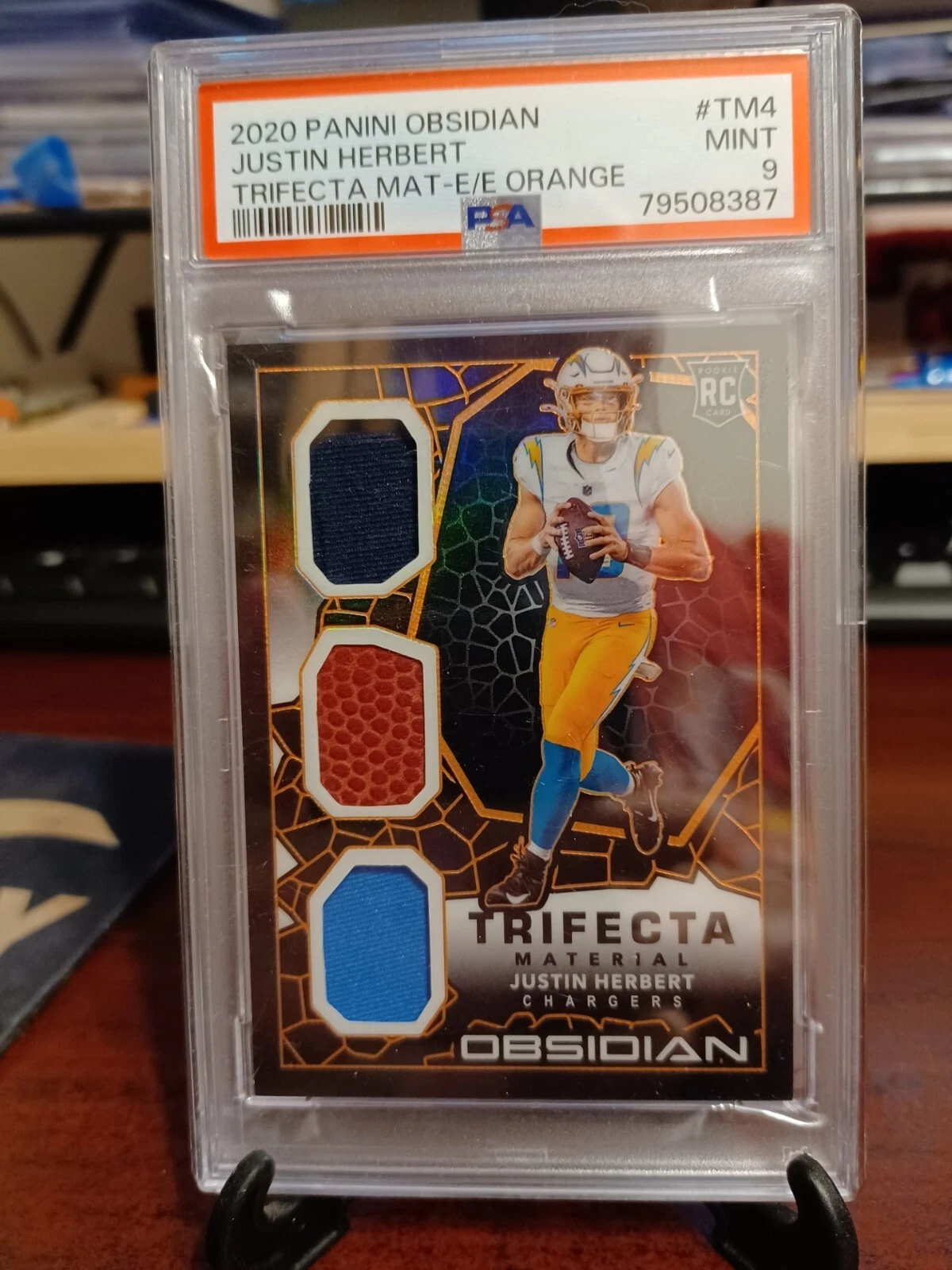Justin Herbert Panini Obsidian Trifecta Material #TM4 Electric Etch-Orange
