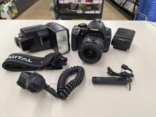 Canon EOS Kiss Digital X DSLR camera with lens, flash, remote, accessories used