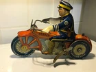 Marx 1930's tin litho Rookie Cop balloon tires USA runs some