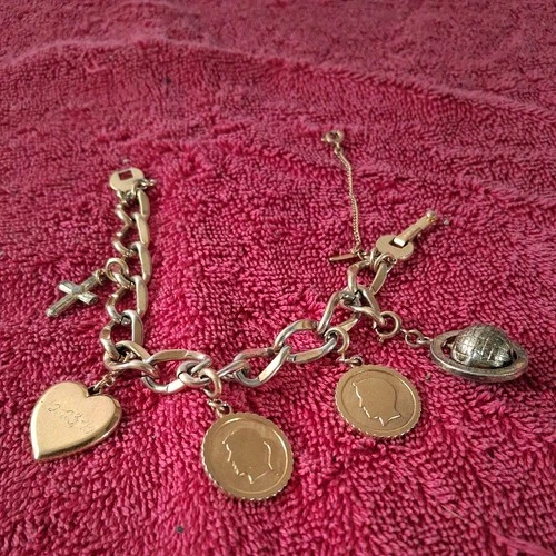 Vintage MONET four piece gold toned charm bracelet old costume jewelry cross