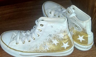 lightly used girls high top converse with gold stars