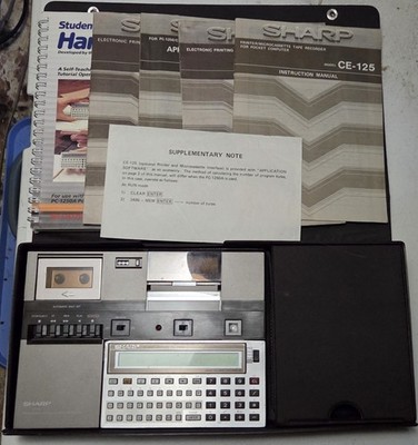 Sharp PC-1250A with Books, Charger, and more