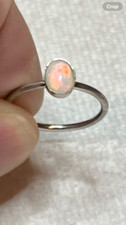  168B- .50ct Genuine Ethiopian Welo Opal set in a Size 7 Sterling Silver Ring