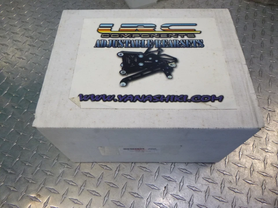 Juego trasero cromado Yamaha YZF R6 CNC Billet aluminio ajustable nuevo EE. UU. Foto 2 de 2