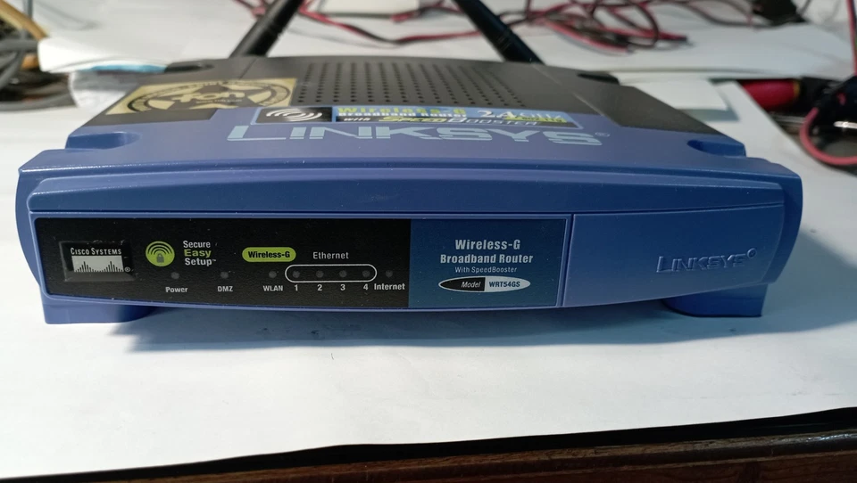 Linksys WRT54GS V 4 Wireless-G Broadband Router with SpeedBooster avec PSU - Photo 1/4