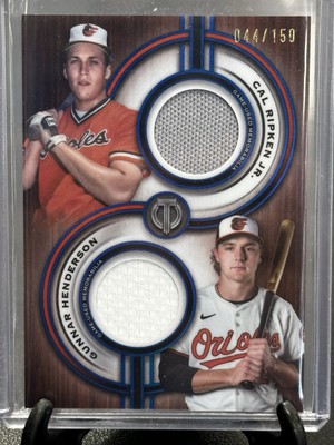 CAL RIPKEN JR GUNNAR HENDERSON 2025 TOPPS TRIBUTE DUAL PATCH BLUE /150