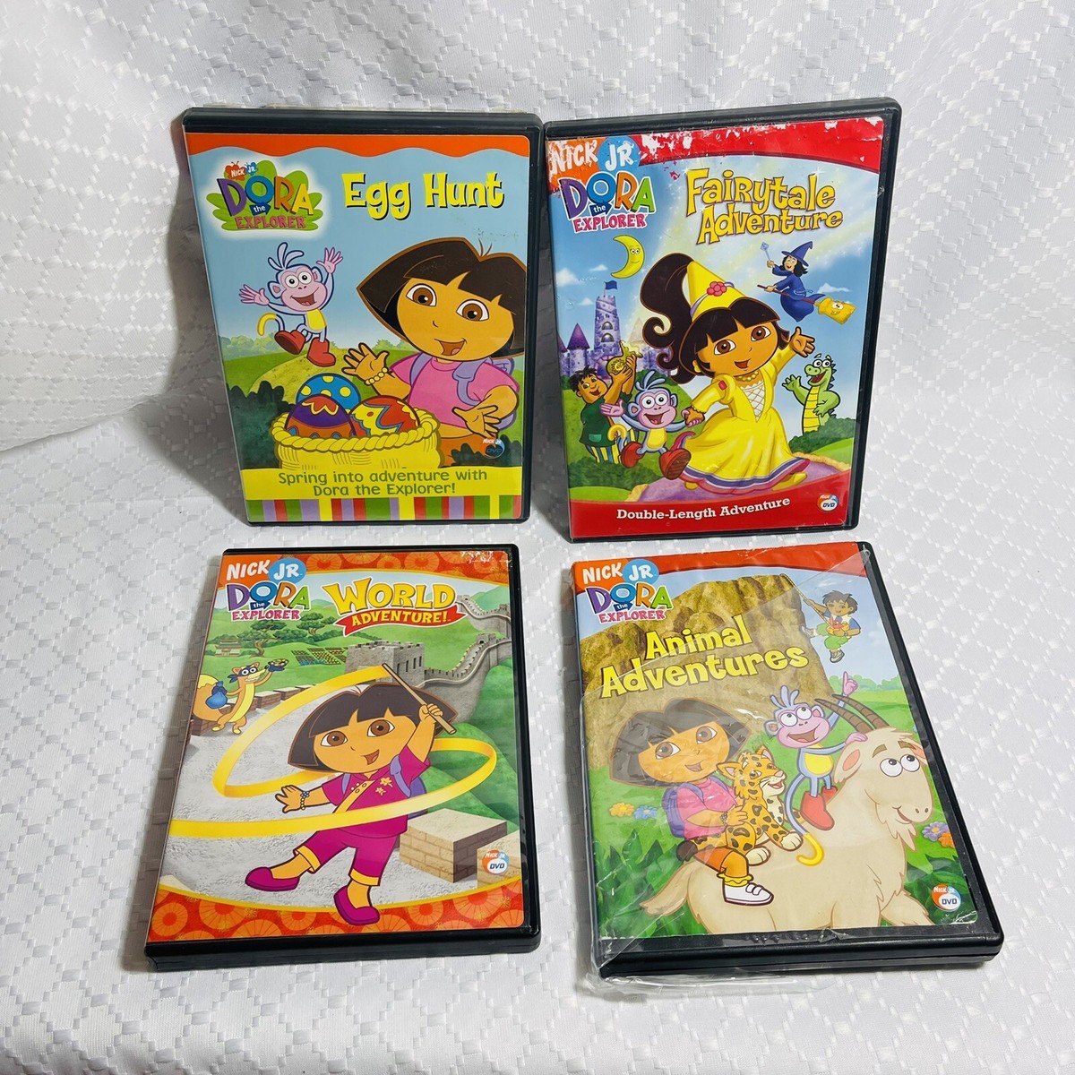 Lot of 4 Dora the Explorer DVDS: Egg Hunt-World Adv- Animal Adv