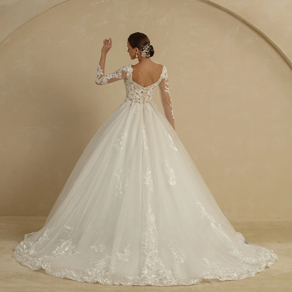 Elegant Ivory Ball Gown Wedding Dress with V-neck Long Sleeves Lace Applique - Image 2 of 4