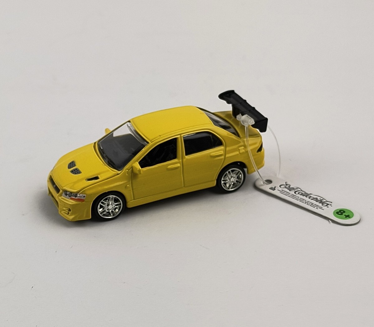 Fast & Furious Yellow Mitsubishi Lancer Evo VII 1:64 Ertl