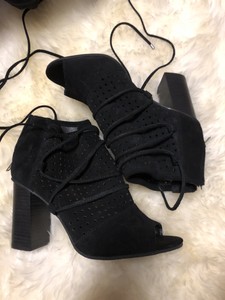 very volatile black booties