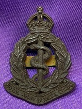 Genuine WW2 Plastic Economy The Royal Army Medical Corps Cap Badge w/blades