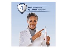 Oral-B Pro 1000 Rechargeable Electric Toothbrush, White. LIKENEW 12