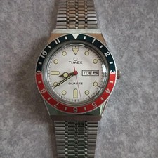 TIMEX Q 38mm Quartz Watch White Dial Red Black Bezel Day Date