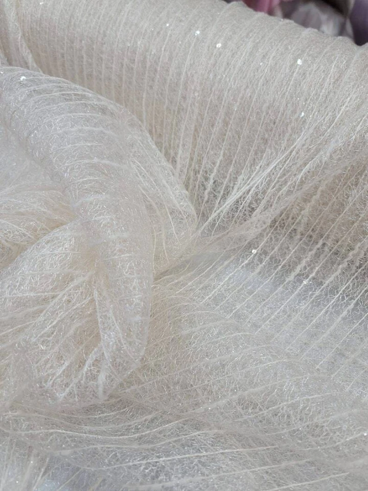 Vestido de novia bordado de encaje marfil tela de lentejuelas transparentes vendido por yarda Fas Foto 4 de 4