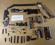 Taurus, PT 100 AFS, 40, 30+/- misc parts, hammer, slide stop, safety, pins, G-14