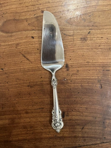 Grand baroque Sterling Cheese Knife 7 1/8”