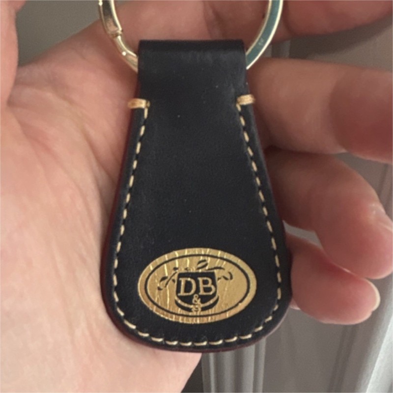 Dooney & Bourke Black Leather Keyring with Gold-Tone Metal Logo Accent