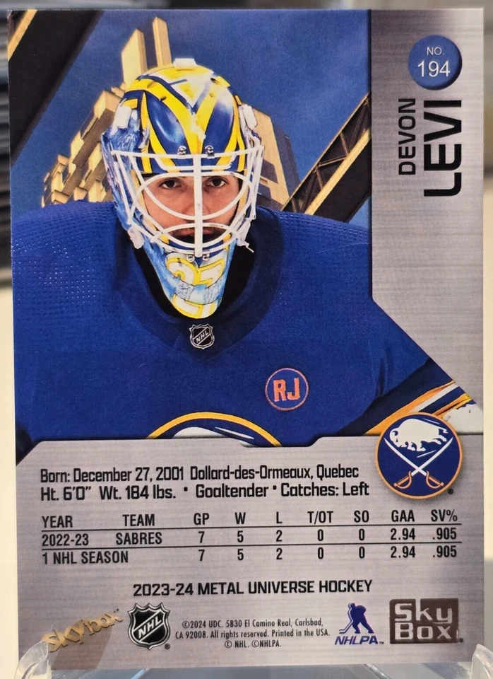 Devon Levi 2023-24 Skybox Metal Universe Rookie RC #194 Buffalo Sabres - Image 2 of 2