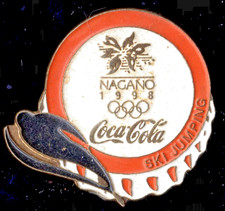 NAGANO 1998 OLYMPIC GAMES. SPONSOR PIN. COCA COLA CAP. SKI JUMPING