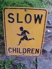 Vintage SLOW CHILDREN Metal Embossed ROAD SIGN
