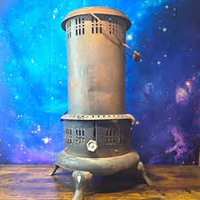 United States Stove Co. Model 580 E T kerosene  Metal Heating Stove