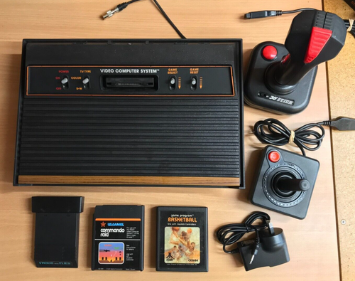 ATARI 2600 4-SWITCH WOODY NTSC CONSOLE + ACCESSORIES + 3 GAMES ** FREE POST **
