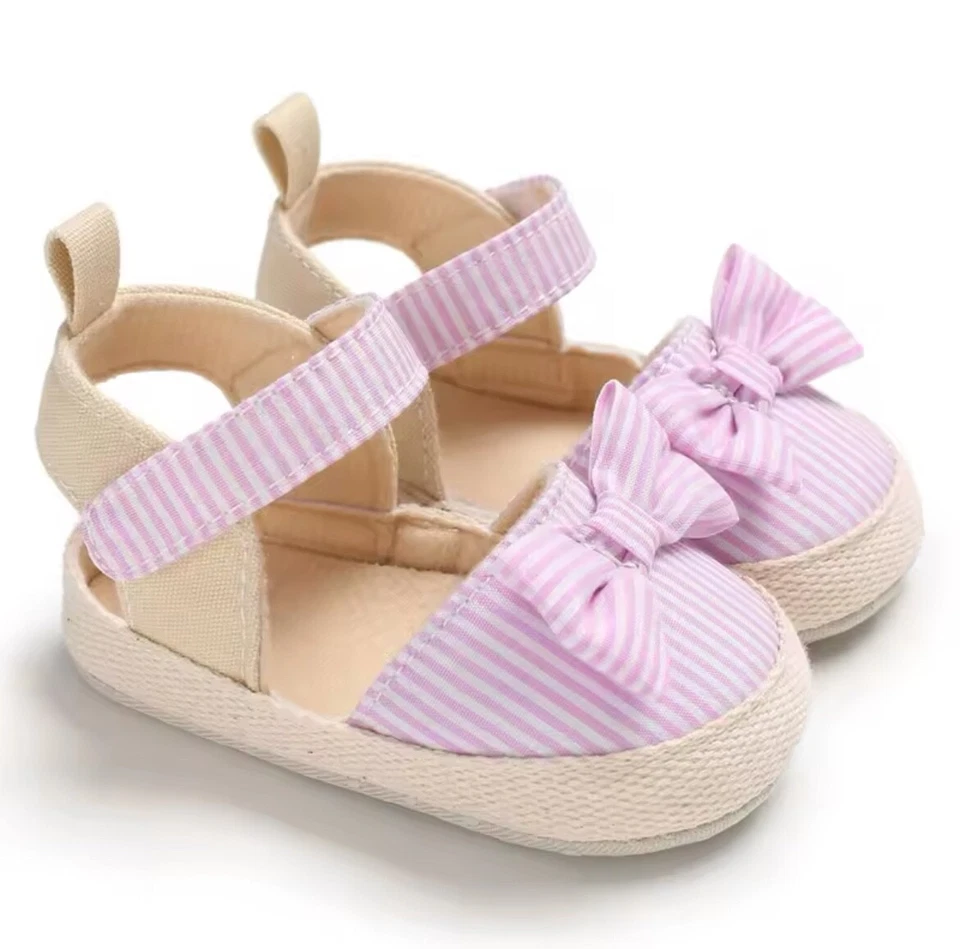 Sandalias de verano para bebé niña - suela suave, diseño de lona con lazo Foto 2 de 4