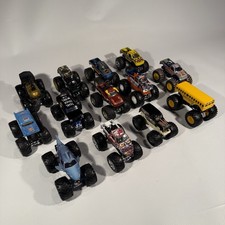 Lot of 13 Monster Jam Trucks Hot Wheels Grave Digger Megaladon Zombie Higher Edu