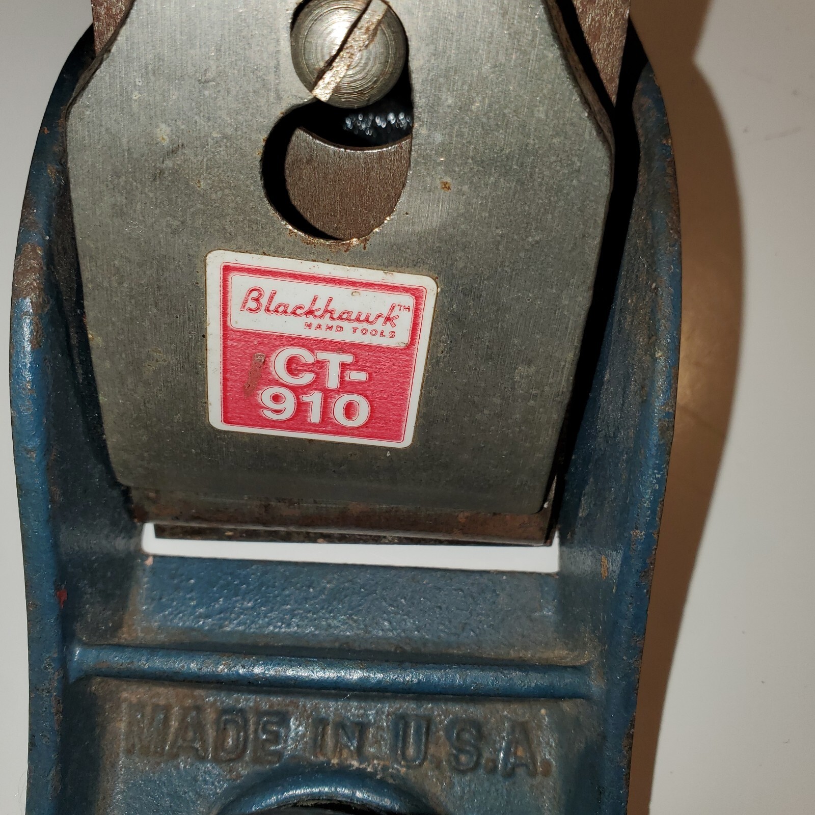 Vintage Blackhawk C557MP wood hand plane with worn silver handle, red “CT-910” label, and embossed “Made in U.S.A.” text.