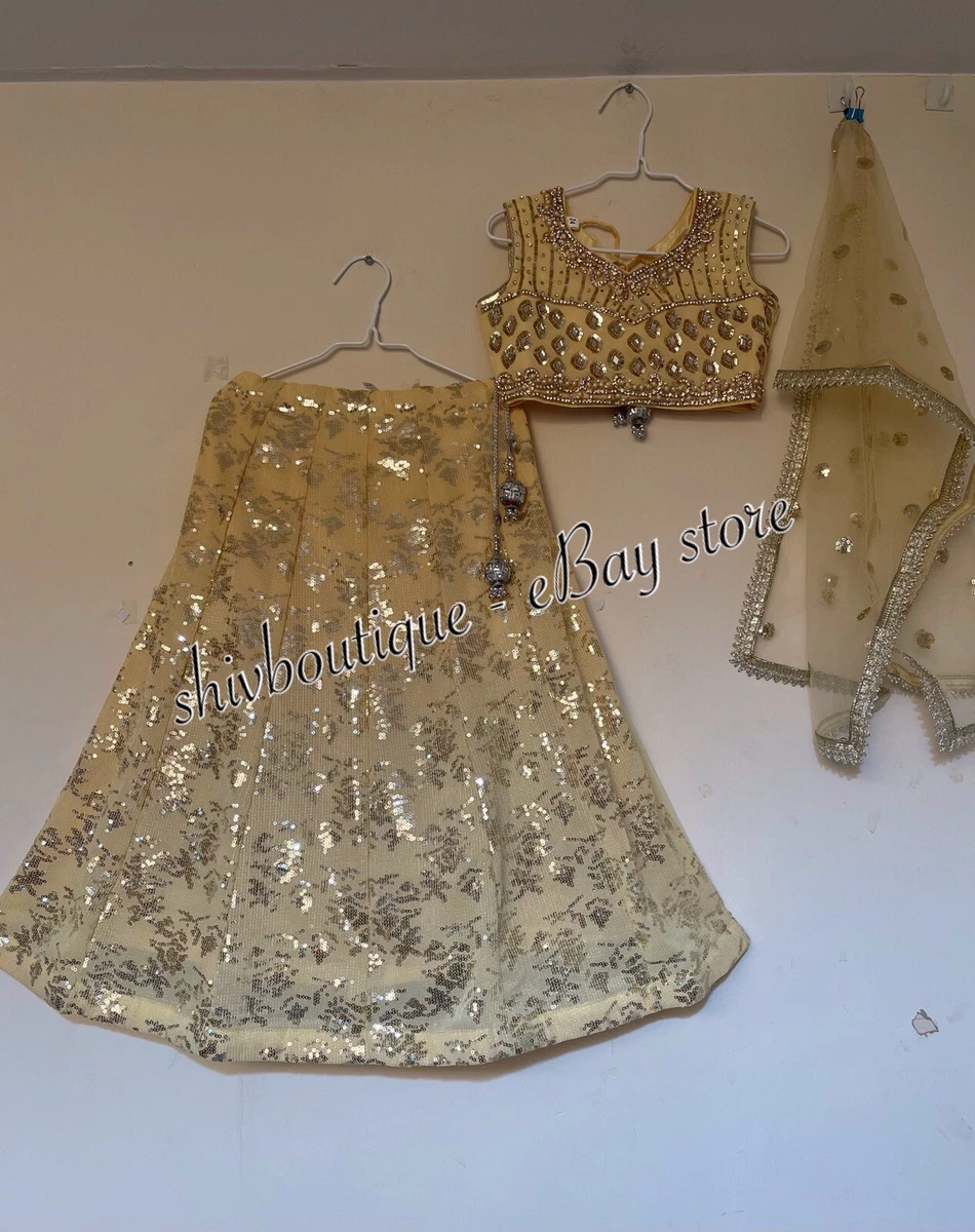 Golden lehenga shop for girls